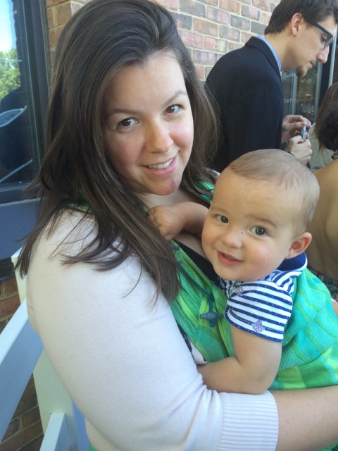 Courtney Parmigiani, client of Tribe of Miine, holding her baby son Jackson